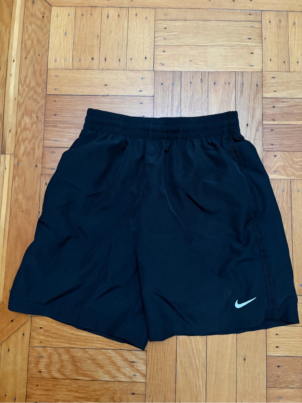 Nike Women's Black Athletic Shorts with White Swoosh